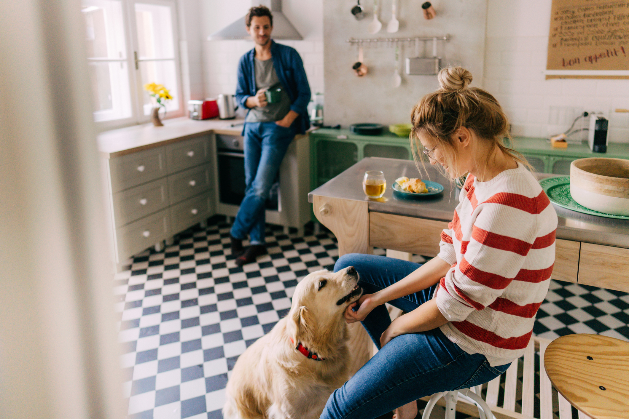 Millenial family with dog living in their urban home that was a resale, not newly built.